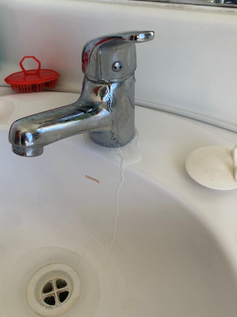 sink tap broken leaking